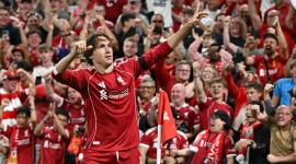 Liverpool's Italian striker #14 Federico Chiesa celebrates scoring their third goal during the English Premier League football match between Liverpool and Bournemouth at Anfield in Liverpool, north west England on August 15, 2025. (Photo by Paul ELLIS / AFP) / RESTRICTED TO EDITORIAL USE. NO USE WITH UNAUTHORIZED AUDIO, VIDEO, DATA, FIXTURE LISTS, CLUB/LEAGUE LOGOS OR 'LIVE' SERVICES. ONLINE IN-MATCH USE LIMITED TO 120 IMAGES. AN ADDITIONAL 40 IMAGES MAY BE USED IN EXTRA TIME. NO VIDEO EMULATION. SOCIAL MEDIA IN-MATCH USE LIMITED TO 120 IMAGES. AN ADDITIONAL 40 IMAGES MAY BE USED IN EXTRA TIME. NO USE IN BETTING PUBLICATIONS, GAMES OR SINGLE CLUB/LEAGUE/PLAYER PUBLICATIONS. /