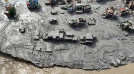 A drone view shows mud covering buildings and property following devastating floods at Trishuli in Nuwakot district, Nepal, August 27, 2026. REUTERS/Navesh Chitrakar