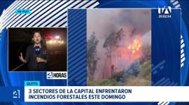 El Cuerpo de Bomberos combate los flagelos registrados este domingo; la vía principal del sector permanece cerrada al tránsito. Un reportaje de Brigette Mancheno
