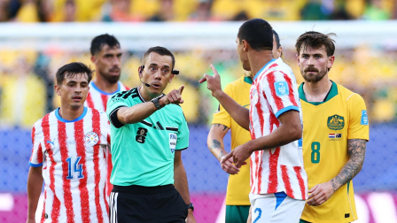 Soccer Football - FIFA World Cup 2026 - Group D - Paraguay v Australia - San Francisco Bay Area Stadium, Santa Clara, California, U.S. - June 25, 2026 Referee Clement Turpin speaks to Paraguay's Gustavo Velazquez during the match REUTERS/Eloisa Lopez