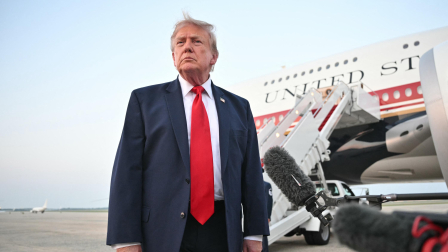US President Donald Trump speaks to reporters after stepping off Air Force One upon returning to Joint Base Andrews in Maryland on July 19, 2026. Trump is returning to the White House from New Jersey, where he attended the 2026 World Cup Final. (Photo by Mandel NGAN / AFP)
