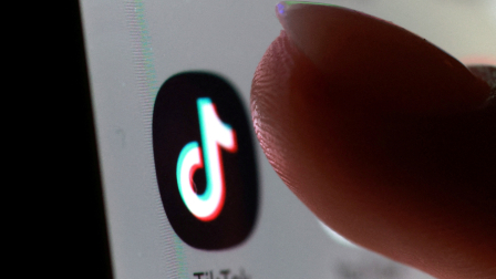 FILE PHOTO: The TikTok app icon on a smartphone in this illustration taken October 27, 2025. REUTERS/Dado Ruvic/Illustration/File Photo