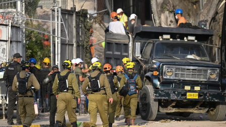 Miembros del ejército israelí llegan al lugar de un edificio colapsado para colaborar en las operaciones de rescate tras un terremoto en Cali, Colombia, el 14 de agosto de 2026. Las probabilidades de hallar supervivientes del terremoto en Colombia disminuyeron