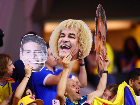 Soccer Football - FIFA World Cup 2026 - Group K - Uzbekistan v Colombia - Estadio Azteca, Mexico City, Mexico - June 17, 2026 Colombia fan holds up a picture of Carlos Valderrama in the stands before the match REUTERS/Eloisa Sanchez