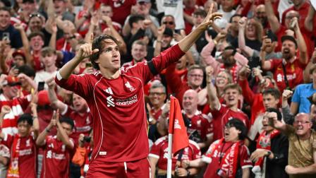 Liverpool's Italian striker #14 Federico Chiesa celebrates scoring their third goal during the English Premier League football match between Liverpool and Bournemouth at Anfield in Liverpool, north west England on August 15, 2025. (Photo by Paul ELLIS / AFP) / RESTRICTED TO EDITORIAL USE. NO USE WITH UNAUTHORIZED AUDIO, VIDEO, DATA, FIXTURE LISTS, CLUB/LEAGUE LOGOS OR 'LIVE' SERVICES. ONLINE IN-MATCH USE LIMITED TO 120 IMAGES. AN ADDITIONAL 40 IMAGES MAY BE USED IN EXTRA TIME. NO VIDEO EMULATION. SOCIAL MEDIA IN-MATCH USE LIMITED TO 120 IMAGES. AN ADDITIONAL 40 IMAGES MAY BE USED IN EXTRA TIME. NO USE IN BETTING PUBLICATIONS, GAMES OR SINGLE CLUB/LEAGUE/PLAYER PUBLICATIONS. /