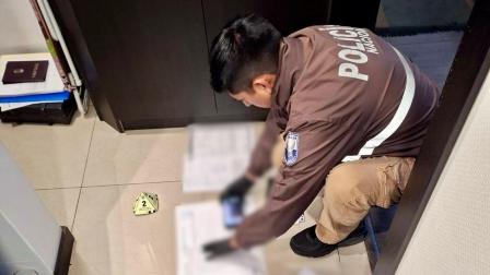 Agentes de la Policía incautaron documentos, celulares, computadores durante allanamientos en el caso Apagón.