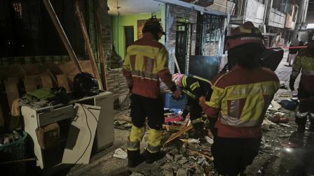 Una pared de una vivienda se vino abajo tras una deflagración de gas en Solanda, en el sur de Quito.